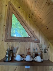 Příslušenství pro přípravu čaje a kávy v ubytování Cabaña Boutique Táva Home