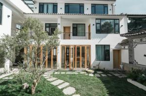 Κήπος έξω από το Dali Ancient Town Xizhou Homestay