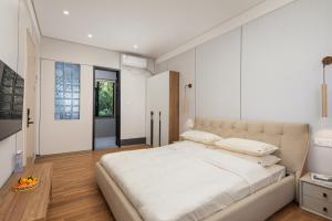 Voodi või voodid majutusasutuse Guilin Reed Flute Retreat Free pick-up service over 2 nights toas