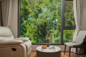 Istumisnurk majutusasutuses Guilin Reed Flute Retreat Free pick-up service over 2 nights