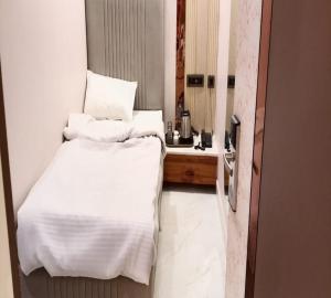 Ένα ή περισσότερα κρεβάτια σε δωμάτιο στο Hotel Spring Vilas