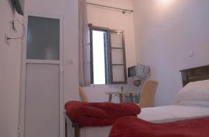 Televisyen dan/atau pusat hiburan di Ziryab Room