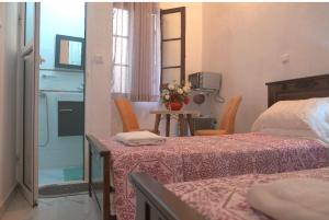 Katil atau katil-katil dalam bilik di Ziryab Room