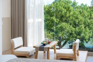 Aed väljaspool majutusasutust Guilin Reed Flute Retreat Free pick-up service over 2 nights