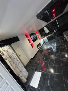 an overhead view of a kitchen with black and white at Suite Perla Mia in Avignon