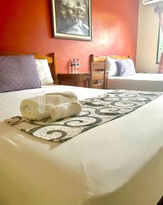 Postel nebo postele na pokoji v ubytování Hotel Santa Lucía, Comayagua + 4 fotografie