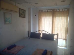 Postel nebo postele na pokoji v ubytování Hulahulahouse