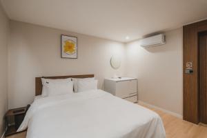 GOYU Hotel客房内的一张或多张床位