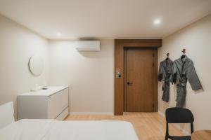 GOYU Hotel客房内的一张或多张床位