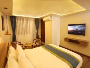 TV o dispositivi per l'intrattenimento presso Harsha Boutique Hotel