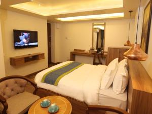 TV o dispositivi per l'intrattenimento presso Harsha Boutique Hotel
