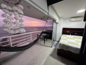 Postel nebo postele na pokoji v ubytování Ocean Suites 1 Exceptional frente al mar