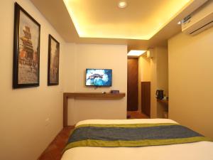 TV o dispositivi per l'intrattenimento presso Harsha Boutique Hotel