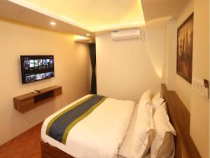 TV o dispositivi per l'intrattenimento presso Harsha Boutique Hotel