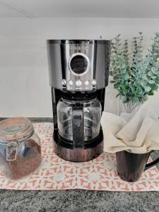 a coffee maker sitting on top of a counter at Boulder Apache Junction in Apache Junction