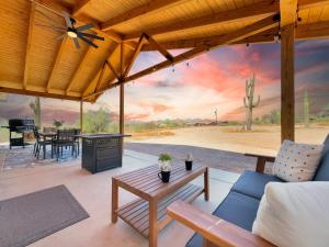 a living room with a view of the desert at Boulder Apache Junction in Apache Junction
