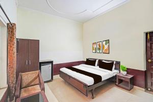 Katil atau katil-katil dalam bilik di Super Collection O Race Course Dehradun +23 gambar