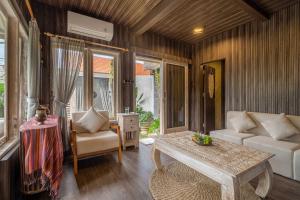 Χώρος καθιστικού στο Villa Rimba by Serenity Property +16 φωτογραφίες