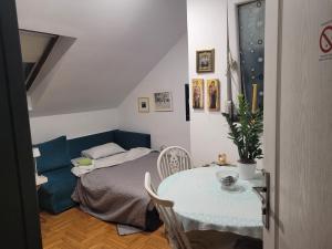 Postel nebo postele na pokoji v ubytování APARTMANI Emerald Dream