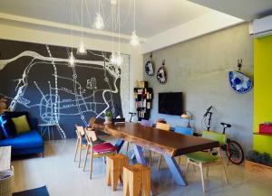 TV a/nebo společenská místnost v ubytování Gengma Homestay