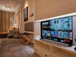 TV a/nebo společenská místnost v ubytování W7 Residence Kundasang