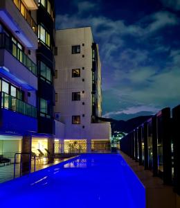 Bazén v ubytování Apto en Condominio parque de las naciones II nebo v jeho okolí