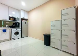 Kuchyň nebo kuchyňský kout v ubytování La Casa Hostel KLCC
