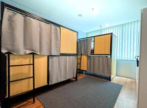 Postel nebo postele na pokoji v ubytování La Casa Hostel KLCC