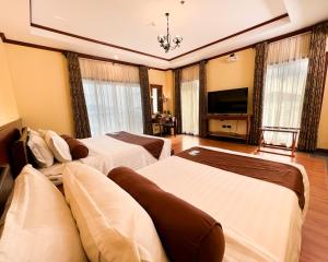 Sunlight Hotel Coron客房内的一张或多张床位