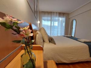 Postel nebo postele na pokoji v ubytování El BALCON DE BAKIO