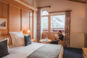 Postel nebo postele na pokoji v ubytování Hotel Carlina