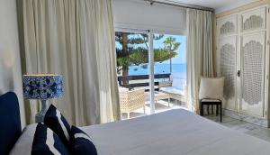 Postel nebo postele na pokoji v ubytování Coral Beach Aparthotel + 37 fotografií