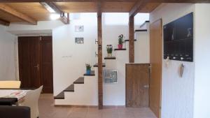 Μια τηλεόραση ή/και κέντρο ψυχαγωγίας στο House Indy +19 φωτογραφίες