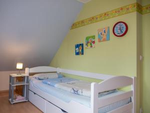 Postel nebo postele na pokoji v ubytování As bi uns to Huus