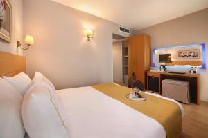 Postel nebo postele na pokoji v ubytování Almina Hotel - Special Class