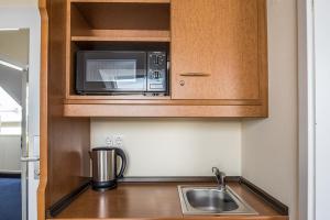 Kuchyň nebo kuchyňský kout v ubytování Hotel Residenz Limburgerhof