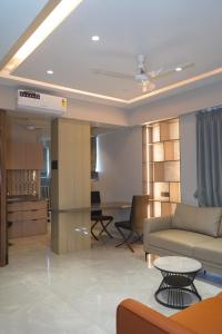 Posezení v ubytování Abssolute Homtel - Rooms & Suites + 37 fotografií