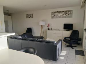TV a/nebo společenská místnost v ubytování Studio Zonneborg