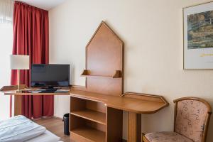 TV a/nebo společenská místnost v ubytování Hotel Residenz Limburgerhof