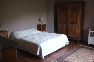 Postel nebo postele na pokoji v ubytování Nabat le Haut, chambre et table d'hotes