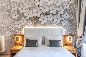 Postel nebo postele na pokoji v ubytování Roma dei Papi B&B