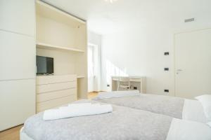 Postel nebo postele na pokoji v ubytování Villa Emilia - Appartamento Niki