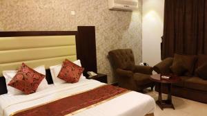 Ένα ή περισσότερα κρεβάτια σε δωμάτιο στο Mkani Apartment