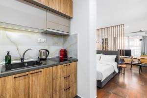 Kuchyň nebo kuchyňský kout v ubytování Elite Central Apartments by BiNoBi! + 41 fotografií