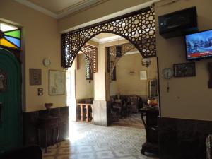 an entrance to a room with an arched doorway at Villa Nile House Luxor in Luxor