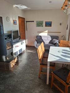 Μια τηλεόραση ή/και κέντρο ψυχαγωγίας στο Ferienhaus Höhenflug