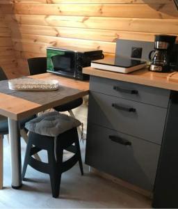 Kuchyň nebo kuchyňský kout v ubytování Chambres d'hôtes les Etoiles