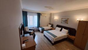 Ένα ή περισσότερα κρεβάτια σε δωμάτιο στο Elite Hotel City Center Corlu Bed and Breakfast
