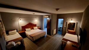 Llit o llits en una habitació de Elite Hotel City Center Corlu Bed and Breakfast