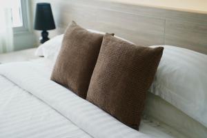 Voodi või voodid majutusasutuse Best Western Chaweng Samui toas